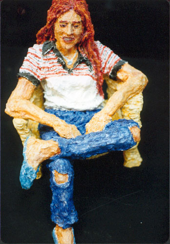 Woman wearing jeans with torn knees